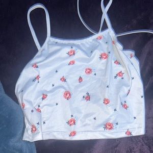 white crop top with red flowers all over